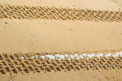 Full frame shot of tire traks