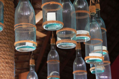 Close-up of glass bottles on table