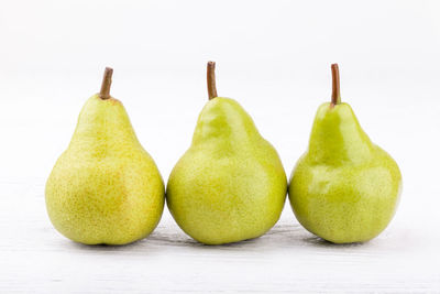 Close-up of fruits against white background