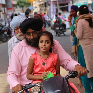 Portrait of couple sitting in car