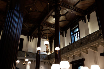 Low angle view of illuminated ceiling