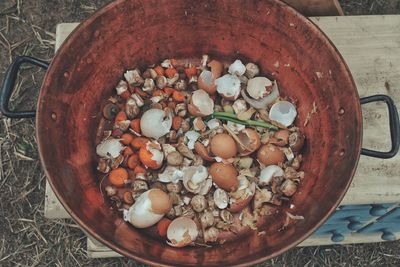 High angle view of food waste in metal container