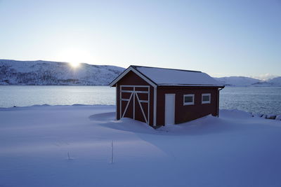 Nordic house in snow landscape in tromso
