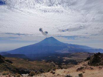 Scenic view of volcanic landscape against sky