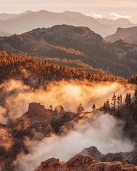 Scenic view of mountains against sky during sunset