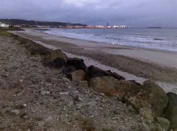 Scenic view of beach against sky