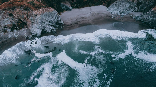 Scenic view of rocks in sea