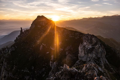 Scenic view of mountains against sky during sunset