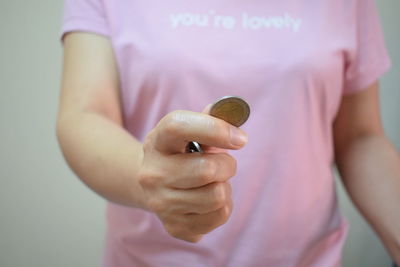 Close-up of woman holding hands