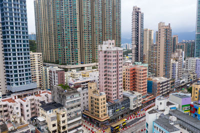 Modern buildings in city against sky