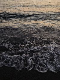 High angle view of surf on beach