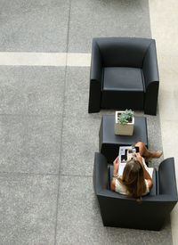 High angle view of woman using laptop