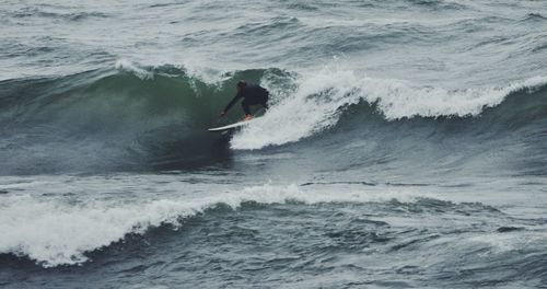 Man surfing in sea