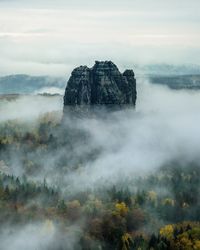 Rock formation in a sea of fog