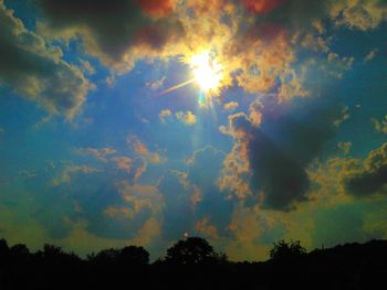 Low angle view of cloudy sky at sunset