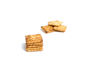 Close-up of cookies against white background