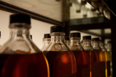 Close-up of beer glass bottles