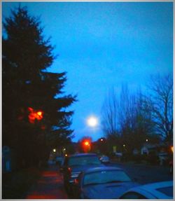 Cars on road at night