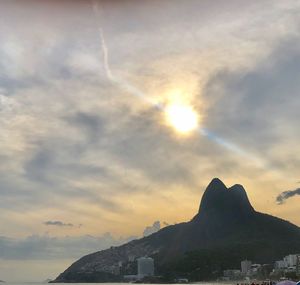Low angle view of buildings against sky during sunset