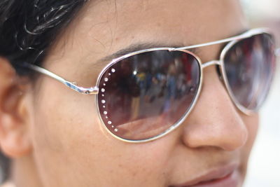 Close-up of woman wearing sunglasses