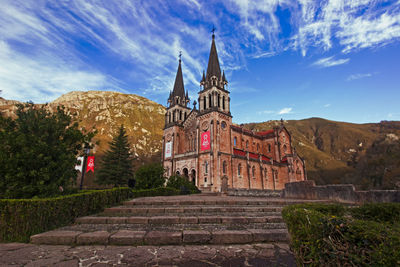 Low angle view of  covadonga church against sky