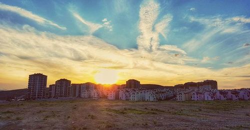 View of built structures at sunset