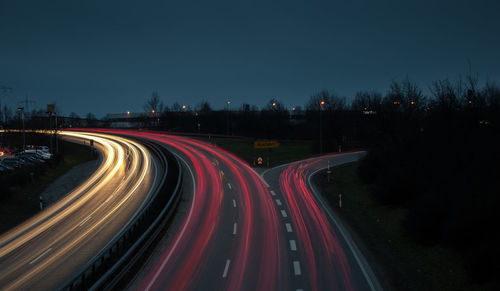 Light trails on road at night