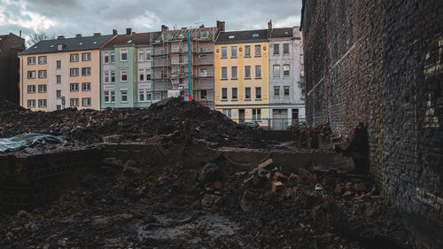 Old buildings against sky