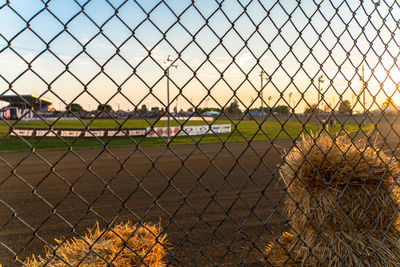 Field seen through chainlink fence