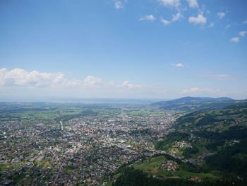 Aerial view of cityscape against sky