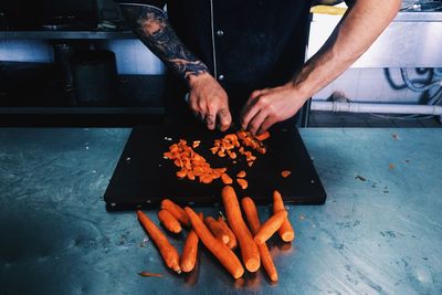 High angle view of man preparing food