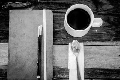 High angle view of coffee cup on table