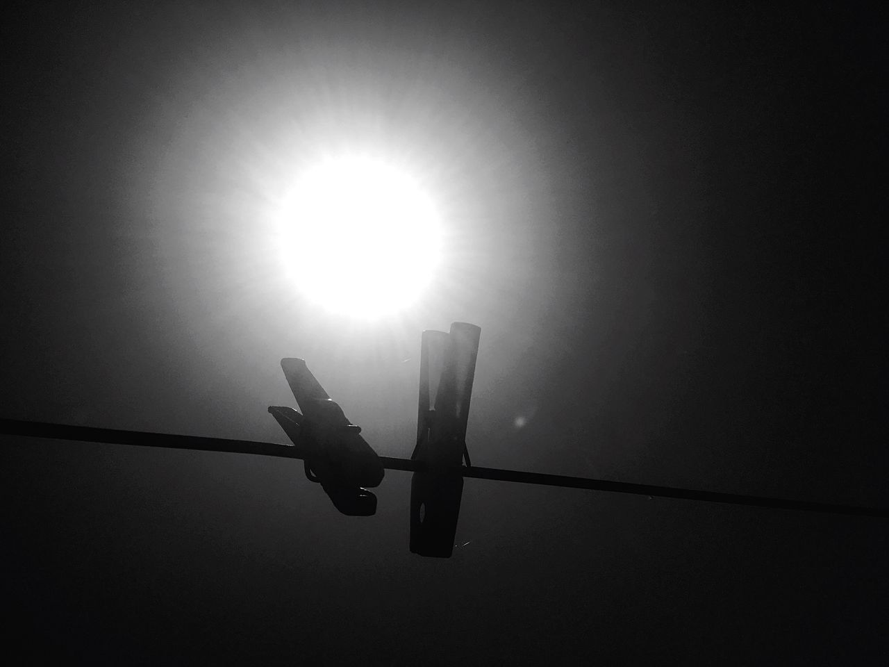 LOW ANGLE VIEW OF LAMP POST AGAINST SKY