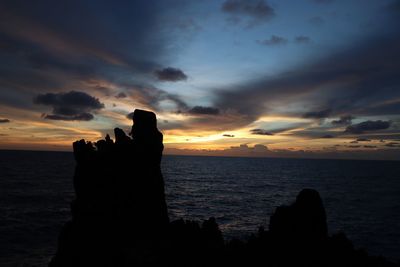 Scenic view of sea at sunset