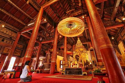 Low angle view of illuminated ceiling of building