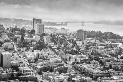 Aerial view of cityscape against sky