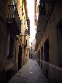 Narrow alley along buildings