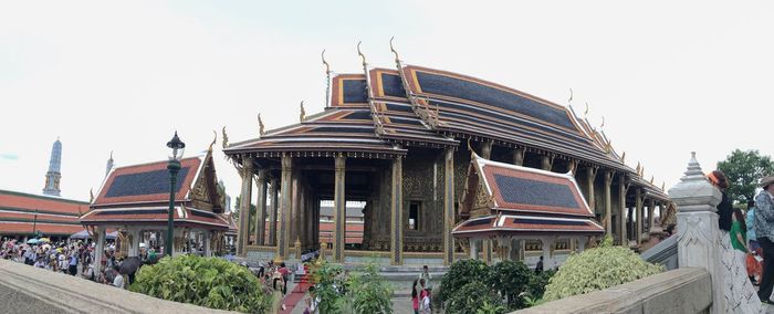 Panoramic view of people against clear sky