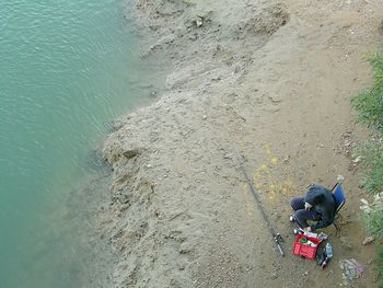 High angle view of man on riverbank