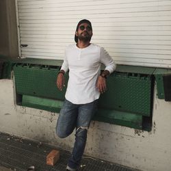 Full length portrait of man standing outdoors