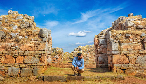 Male tourist at old ruins