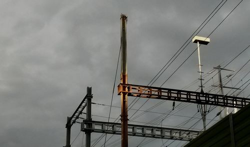 Low angle view of electricity pylon