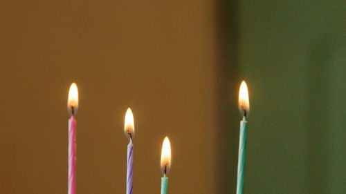 Close-up of burning candles