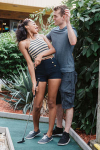 Young couple standing outdoors