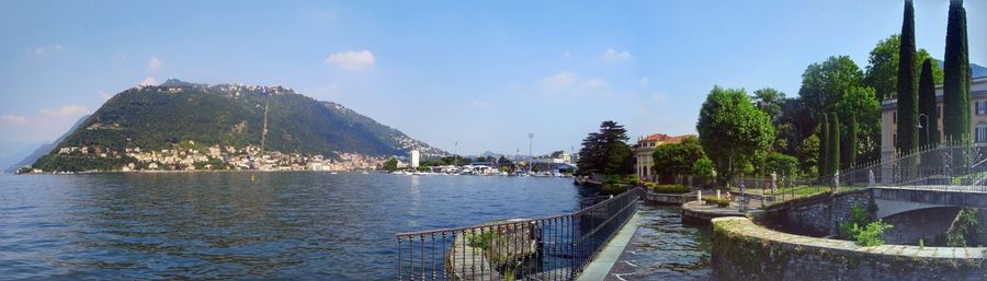 Panoramic view of bay against sky