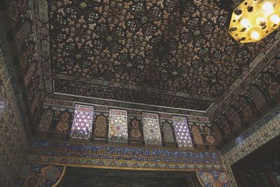 Low angle view of ornate ceiling