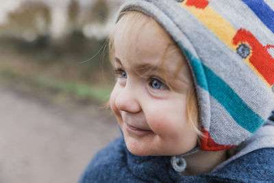 Portrait of cute girl looking away