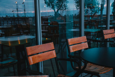 Empty chairs and table in restaurant