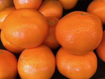 Full frame shot of oranges in market