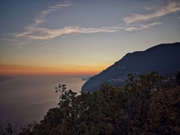 Scenic view of mountains against sky during sunset